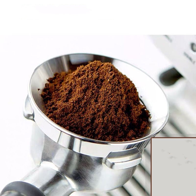 Dosing ring on a portafilter holding ground coffee